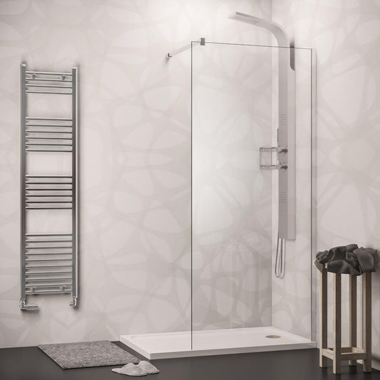 Modern walk-in shower with glass panel, chrome towel radiator, and rainfall shower panel