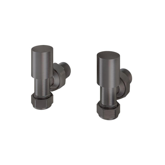 Pair of modern black angled radiator valves on white background