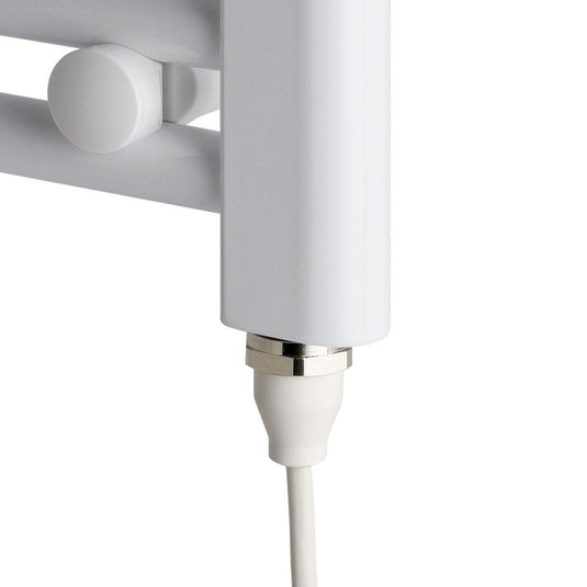 Close-up of white electric heated towel rail with power cable connection