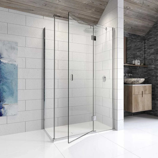 Modern frameless glass shower enclosure with hinged door in a contemporary white tiled bathroom