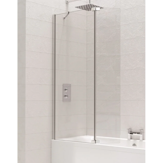 Modern frameless glass bath shower screen with overhead rainfall shower in tiled bathroom