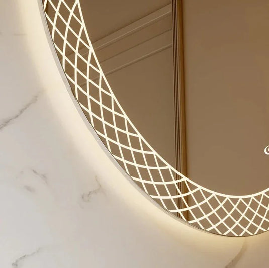 Round LED bathroom mirror with geometric illuminated border on marble wall