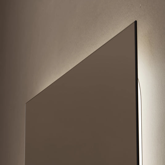 Rectangular bathroom mirror with minimalist design and soft backlit LED lighting