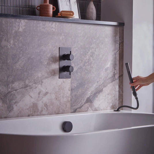 Tavistock Quantum Dual Function Shower System with Overflow Bath Filler & Deck Mounted Handset - Matt Black - SQT1618 - Envy Bathrooms Ltd