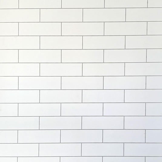 Glossy white metro bathroom wall tiles with a brick pattern layout