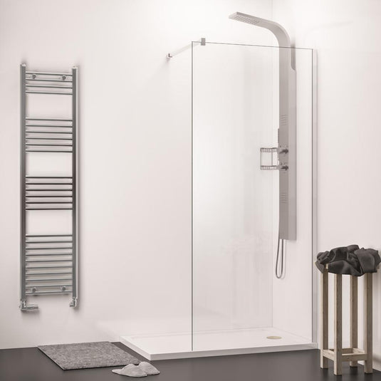 Modern walk-in shower with glass screen, chrome rainfall shower panel and heated towel rail