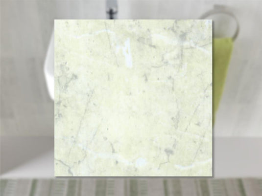 Light marble-effect bathroom wall tile sample with subtle veining, modern decor style