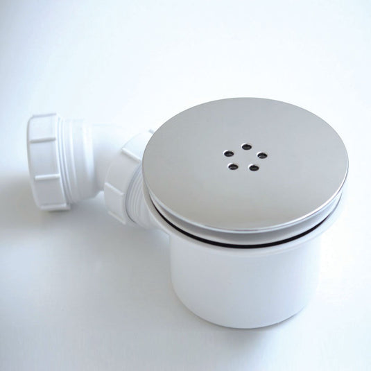 Modern shower waste trap with chrome cover and white plastic body on a white background