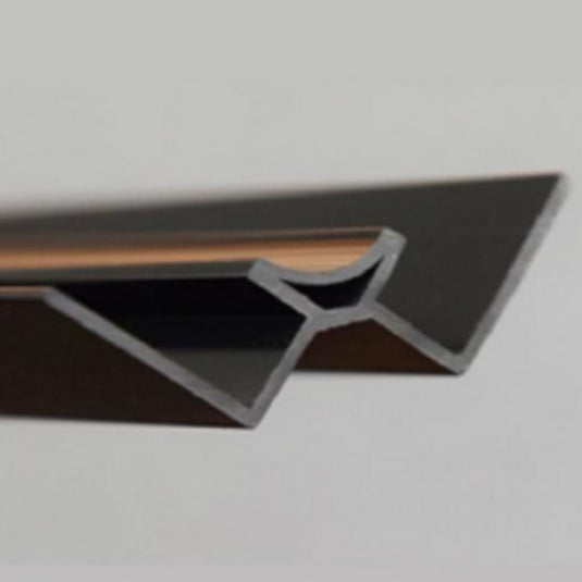 Close-up of angled metal tile trim for bathrooms, showing cross-section profile.