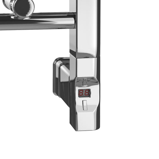 Chrome heated towel rail corner with digital temperature display in modern bathroom.