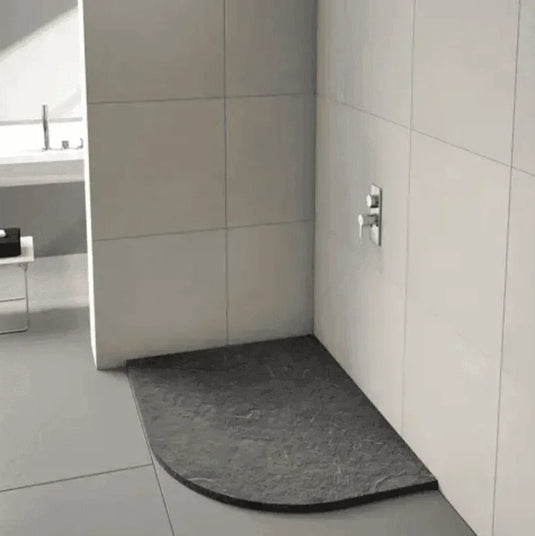 Graphite offset quadrant shower tray with integrated waste in modern tiled bathroom