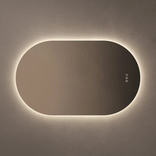 Oval bathroom mirror with backlit LED lighting and touch controls on a neutral wall