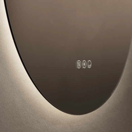 Oval LED bathroom mirror with illuminated touch controls and soft backlighting on wall